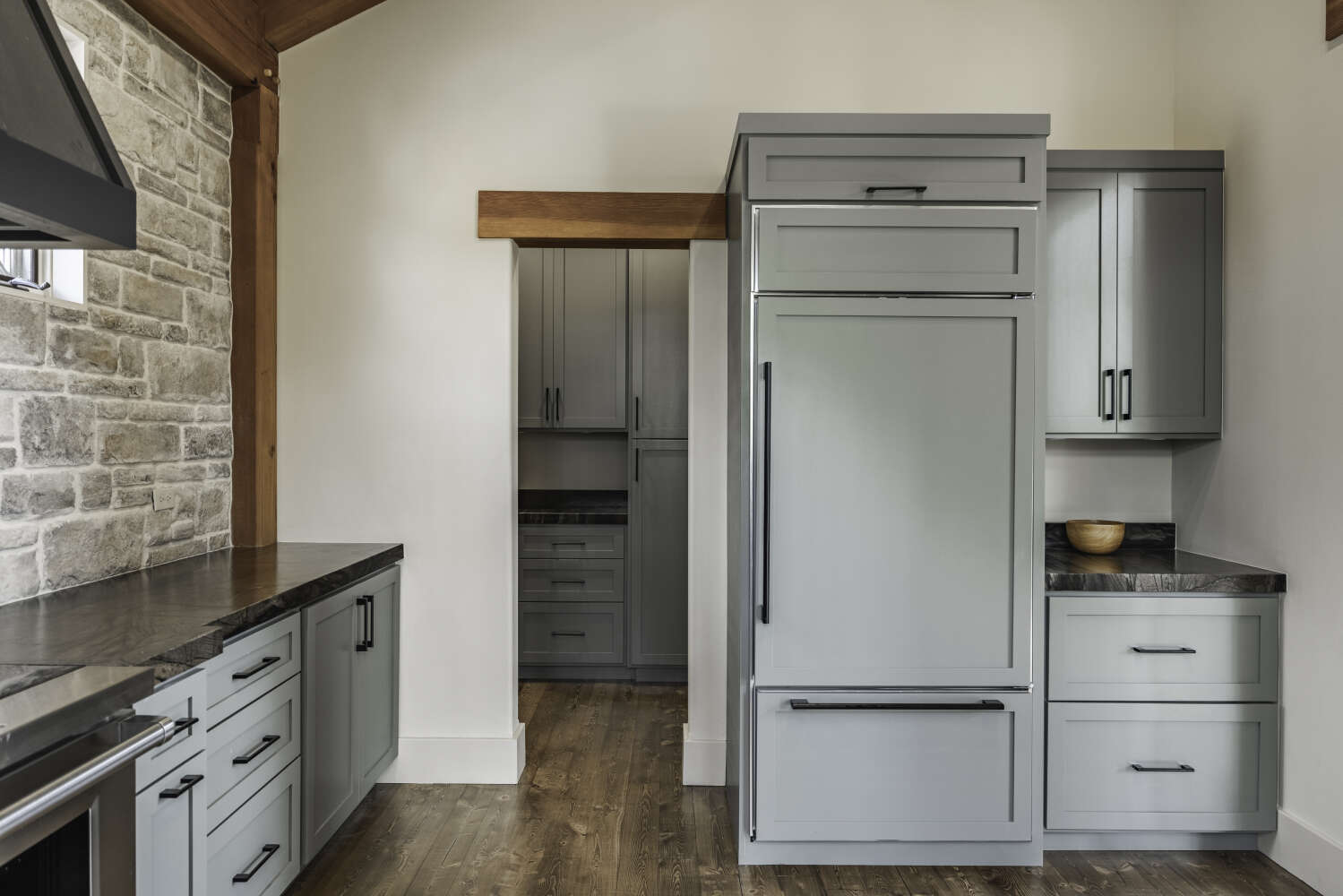 Kitchen pantry and refrigerator wall